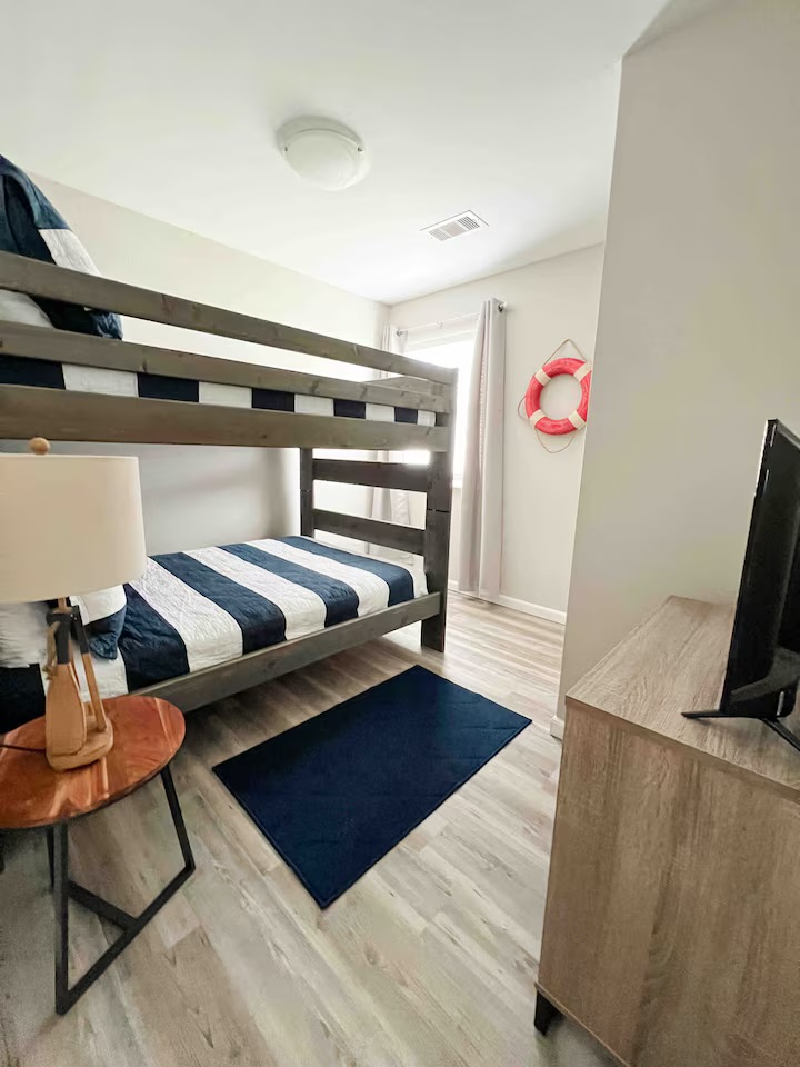 Bunk room with full over full bunks