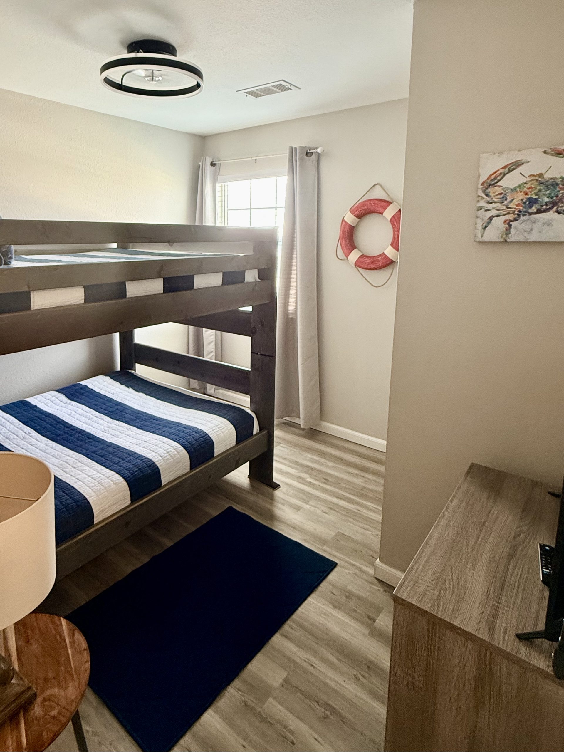 Bunk room with full over full bunks